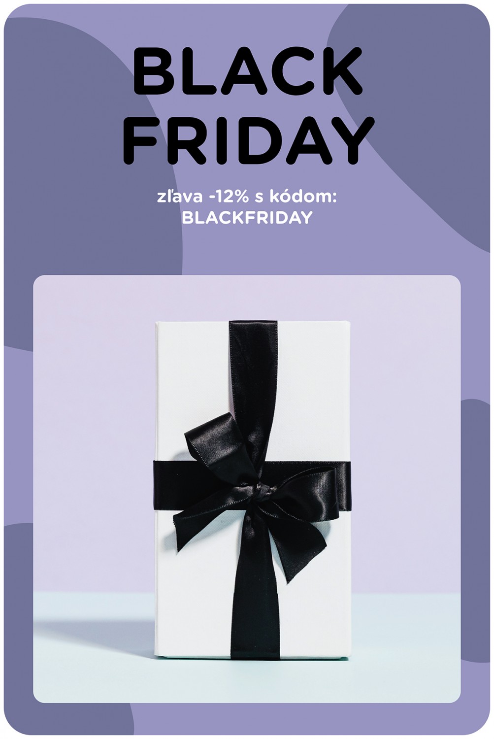 Balíček s čiernou stuhou na fialovom pozadí  k akcii Black Friday v creActive. 